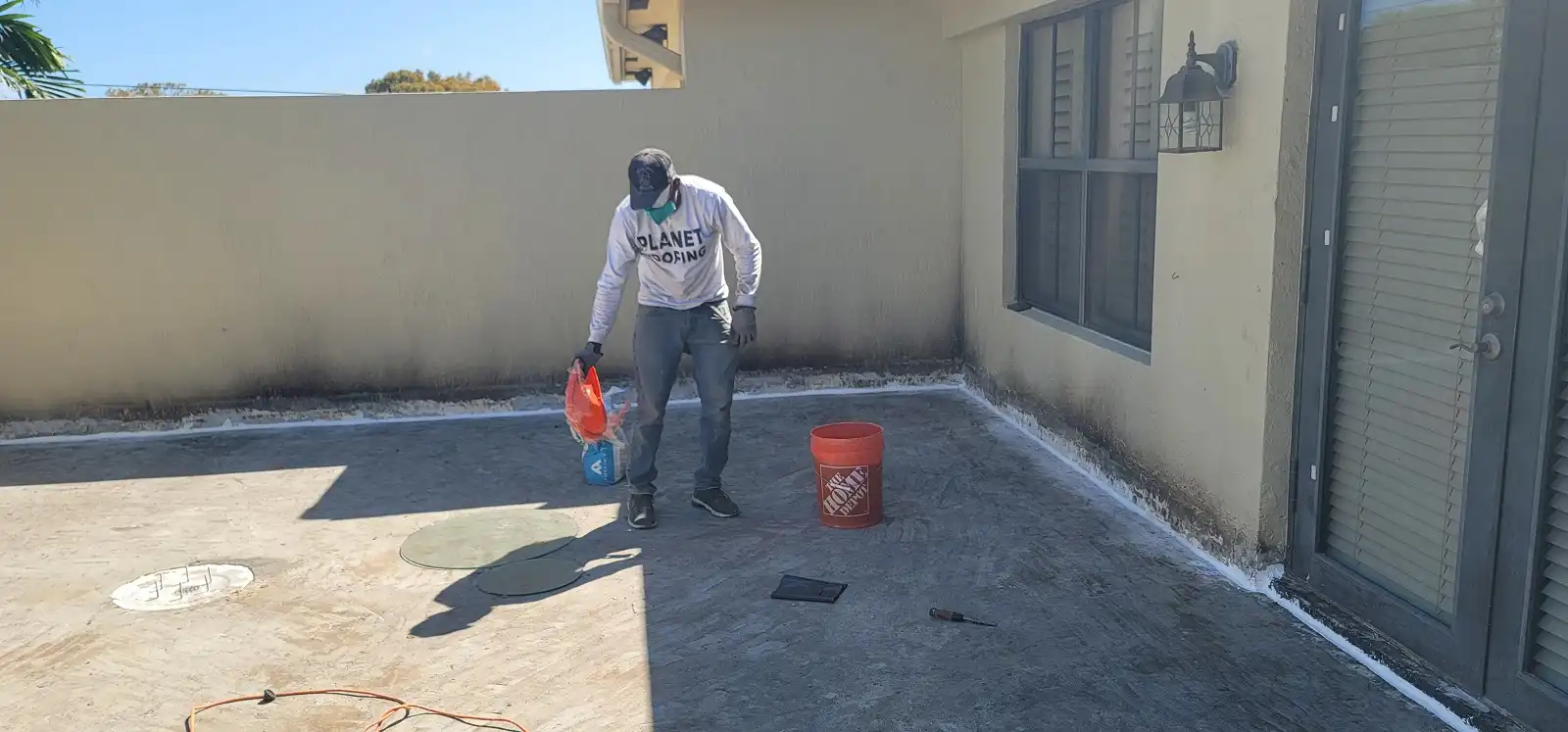 Professional concrete patio deck preparation before applying waterproof sealants